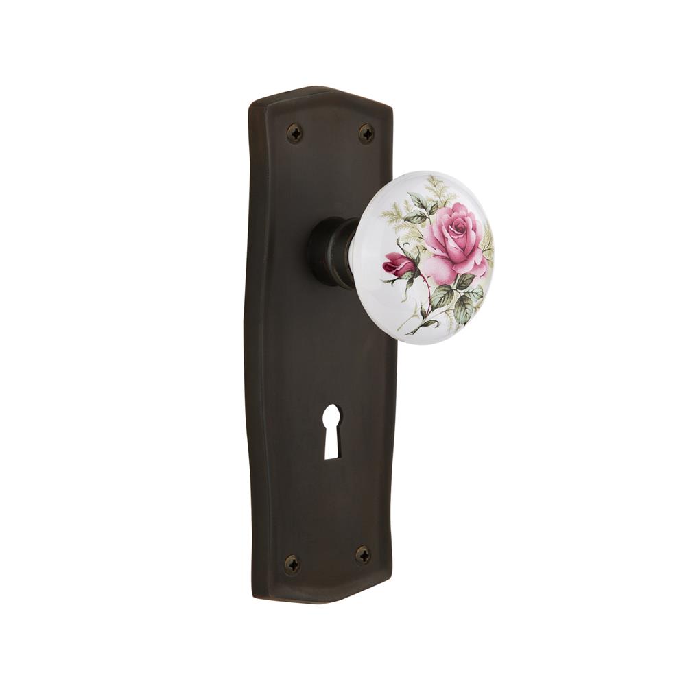 Nostalgic Warehouse PRAROS Passage Knob Prairie Plate with Rose Porcelain Knob with Keyhole in Oil Rubbed Bronze
